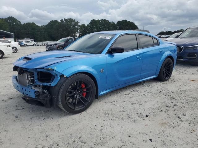 DODGE CHARGER SR 2023 with VIN 2C3CDXL9XPH678303 - Photo from auction