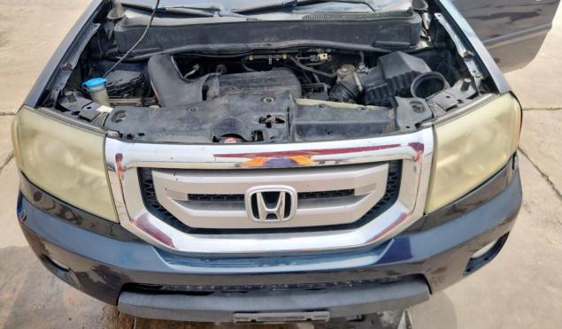 Photo 12 from auction – 2011 HONDA PILOT 4X4 with VIN 5FNYF4H57BB038712