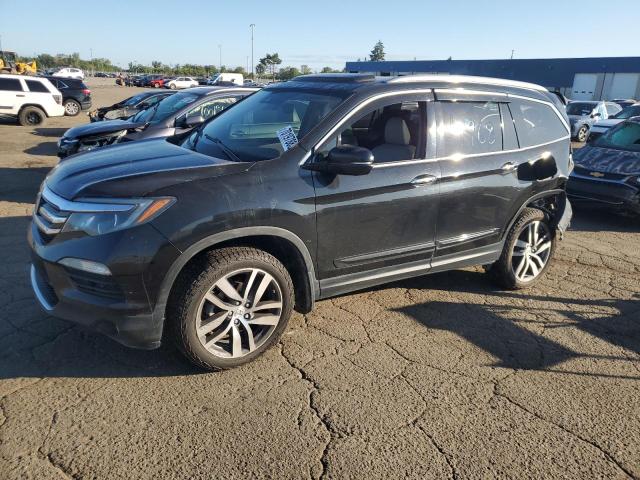 HONDA PILOT ELIT 2016 with VIN 5FNYF6H00GB014968 - Photo from auction