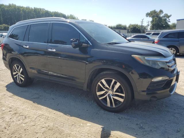 Photo 4 from auction – 2016 HONDA PILOT ELIT with VIN 5FNYF6H00GB037005