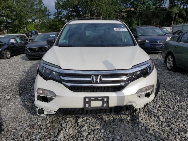 Photo 5 from auction – 2018 HONDA PILOT LX with VIN 5FNYF6H15JB049893