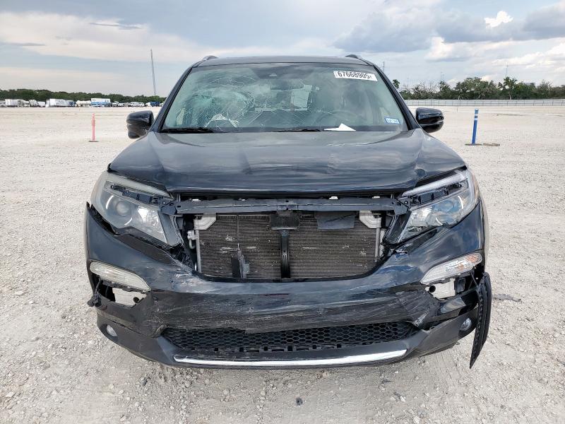 Photo 5 from auction – 2017 HONDA PILOT TOUR with VIN 5FNYF6H90HB009057