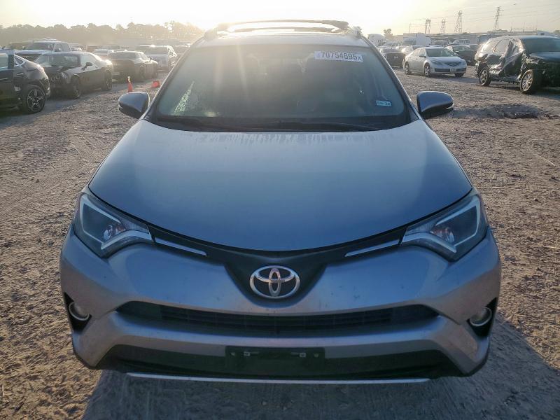 Photo 5 from auction – 2016 TOYOTA RAV4 XLE with VIN 2T3WFREV5GW276682