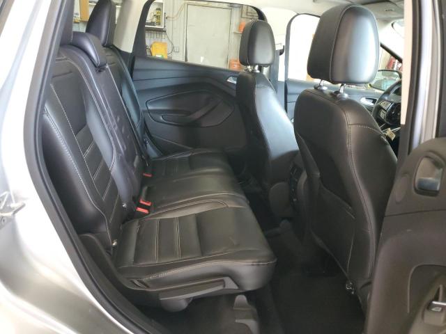 Photo 11 from auction – 2017 FORD ESCAPE TITANIUM with VIN 1FMCU0J98HUE56259