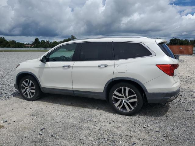 Photo 2 from auction – 2016 HONDA PILOT TOUR with VIN 5FNYF5H96GB001179