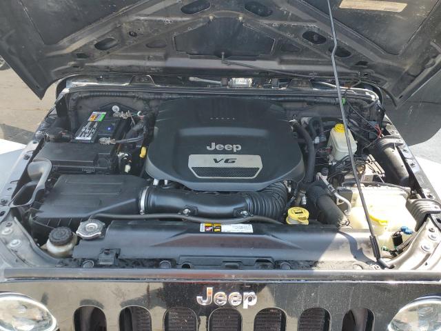 Photo 11 from auction – 2014 JEEP WRANGLER U with VIN 1C4BJWDG4EL113438