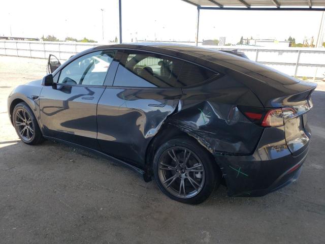 Photo 2 from auction – 2025 TESLA MODEL Y with VIN 7SAYGDED1SF234608