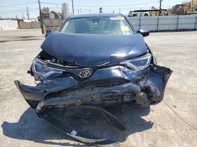 Photo 5 from auction – 2017 TOYOTA RAV4 LE with VIN JTMZFREV2HJ146842