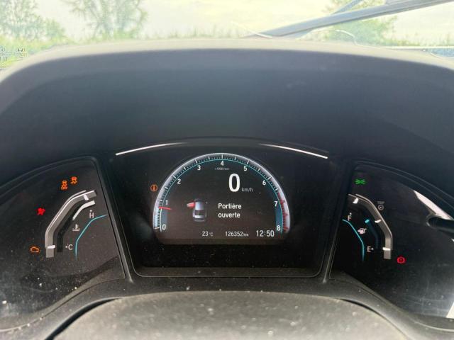 Photo 8 from auction – 2018 HONDA CIVIC LX with VIN 2HGFC2E52JH044615