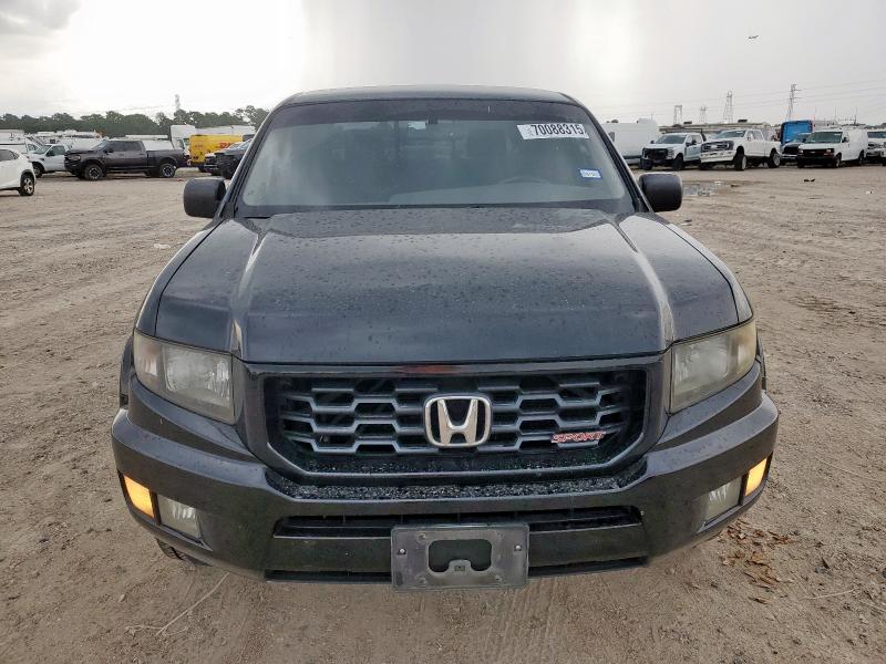 Photo 5 from auction – 2014 HONDA RIDGELINE with VIN 5FPYK1F70EB001205
