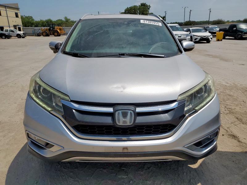 Photo 5 from auction – 2016 HONDA CR-V TOURI with VIN 5J6RM3H90GL020977
