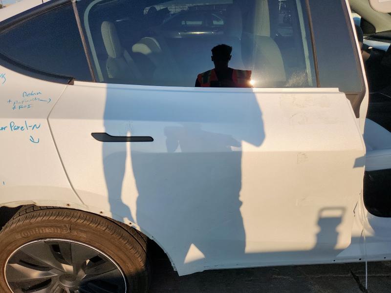 Photo 10 from auction – 2023 TESLA MODEL Y with VIN 7SAYGAEEXPF925408