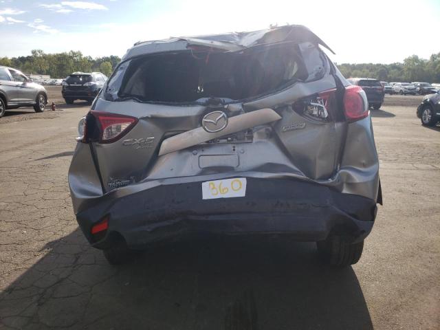 Photo 6 from auction – 2014 MAZDA CX-5 TOURING with VIN JM3KE4CY9E0374611