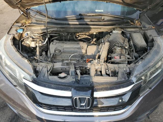 Photo 11 from auction – 2015 HONDA CR-V LX with VIN 5J6RM4H39FL085259