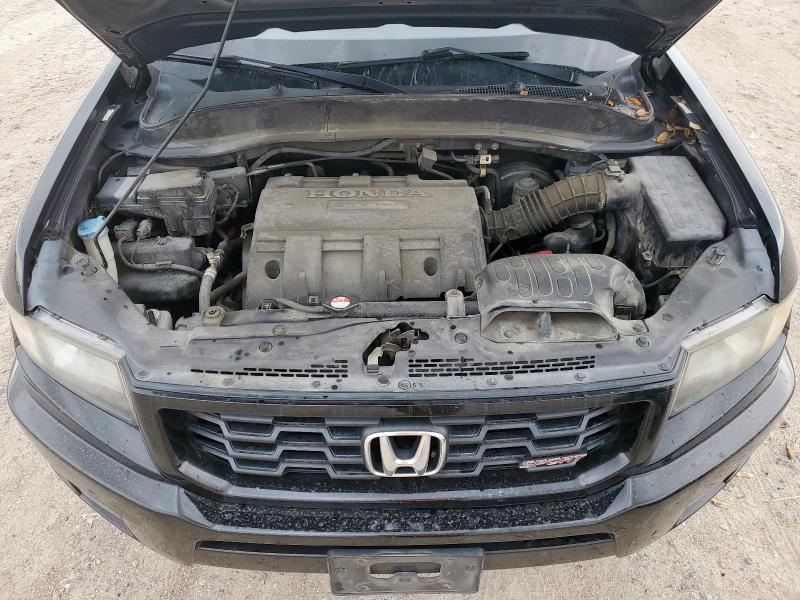 Photo 11 from auction – 2014 HONDA RIDGELINE with VIN 5FPYK1F70EB001205