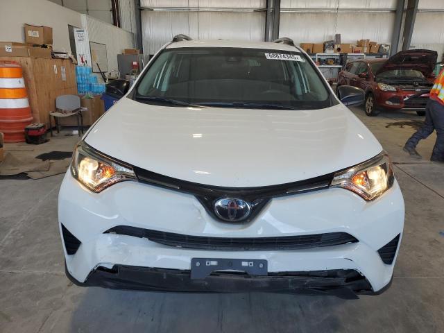 Photo 5 from auction – 2018 TOYOTA RAV4 LE with VIN JTMBFREV8JJ216965