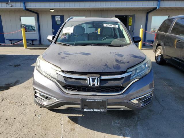 Photo 5 from auction – 2015 HONDA CR-V EXL with VIN 2HKRM3H75FH543726