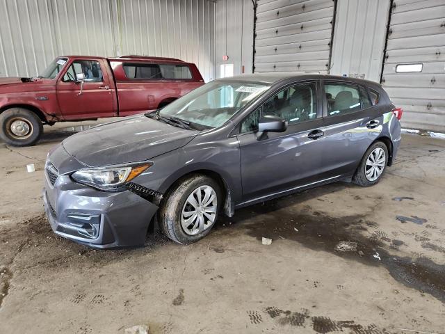 SUBARU IMPREZA 2018 with VIN 4S3GTAA68J3718829 - Photo from auction