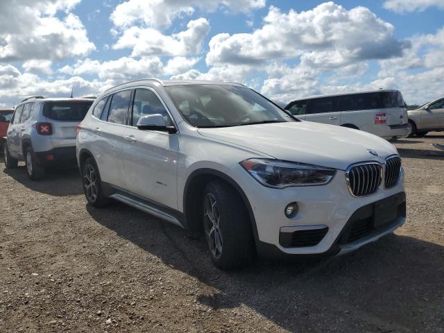 Photo 4 from auction – 2016 BMW X1 XDRIVE2 with VIN WBXHT3C35G5F65459