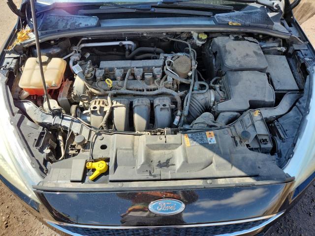 Photo 11 from auction – 2015 FORD FOCUS SE with VIN 1FADP3K21FL210777