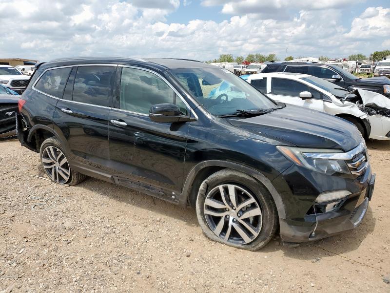 Photo 4 from auction – 2017 HONDA PILOT ELIT with VIN 5FNYF6H05HB060894