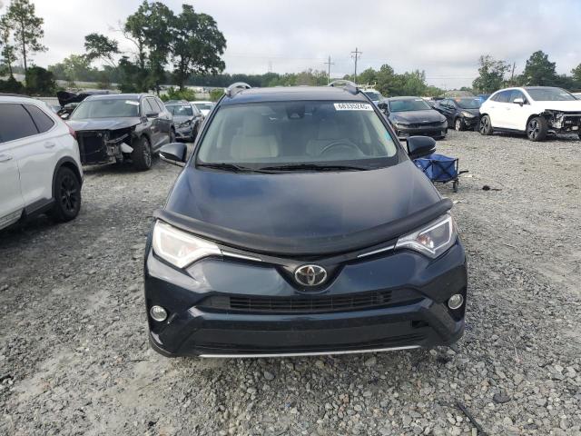 Photo 5 from auction – 2017 TOYOTA RAV4 XLE with VIN JTMWFREV4HD103833