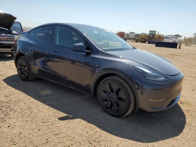 Photo 4 from auction – 2025 TESLA MODEL Y with VIN 7SAYGAEE4SF251829