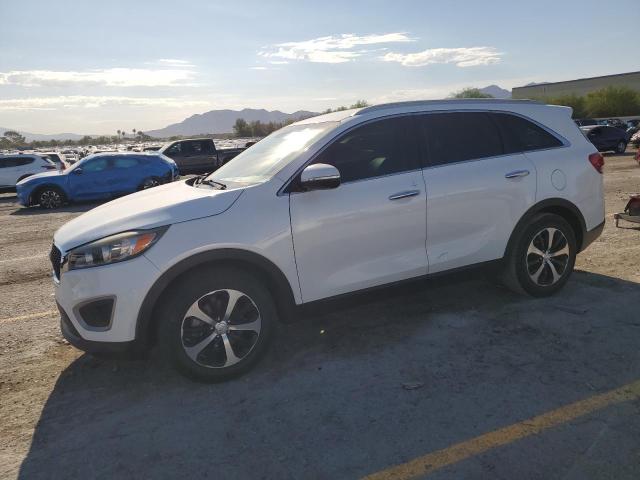 KIA SORENTO EX 2016 with VIN 5XYPH4A13GG055567 - Photo from auction