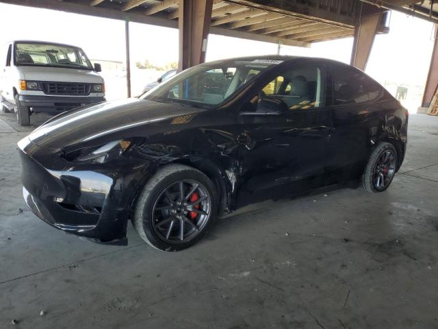 TESLA MODEL Y 2025 with VIN 7SAYGDEF8SF306129 - Photo from auction
