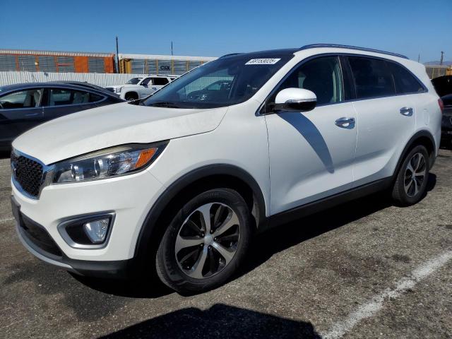 KIA SORENTO EX 2016 with VIN 5XYPH4A55GG182582 - Photo from auction