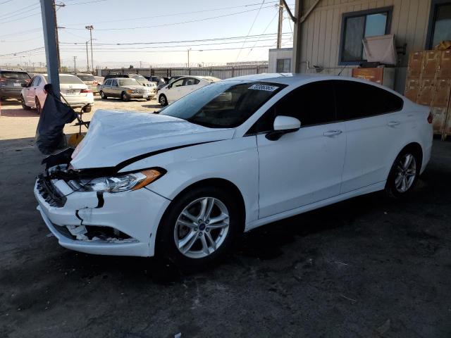 FORD FUSION SE 2018 with VIN 3FA6P0LU3JR204089 - Photo from auction