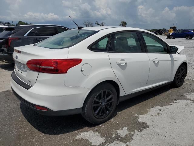 Photo 3 from auction – 2018 FORD FOCUS SE with VIN 1FADP3F20JL248827