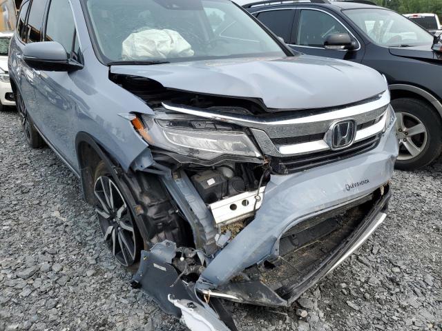 Photo 13 from auction – 2022 HONDA PILOT TOUR with VIN 5FNYF6H66NB506549