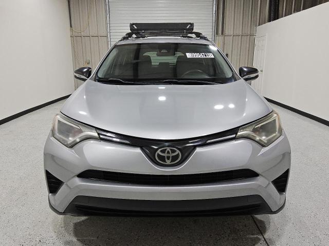 Photo 5 from auction – 2018 TOYOTA RAV4 LE with VIN 2T3ZFREV3JW513223