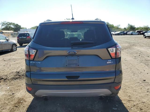 Photo 6 from auction – 2018 FORD ESCAPE SE with VIN 1FMCU9GD8JUC66306