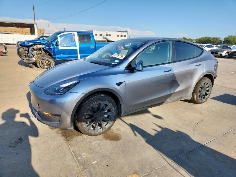 TESLA MODEL Y 2025 with VIN 7SAYGDED5SA359074 - Photo from auction