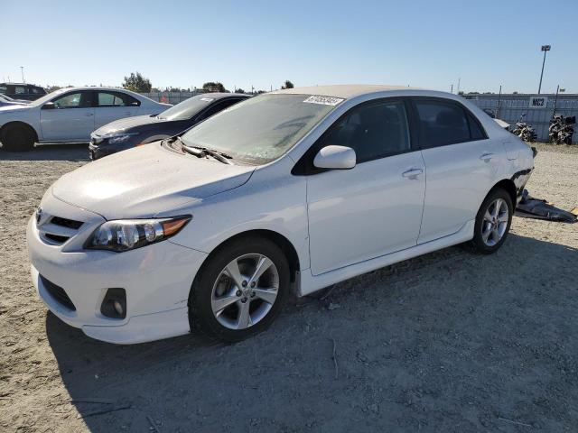 TOYOTA COROLLA BASE 2011 with VIN 2T1BU4EE1BC575273 - Photo from auction