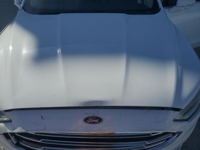 Photo 11 from auction – 2017 FORD FUSION TIT with VIN 3FA6P0RU8HR223495