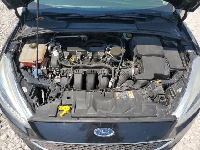 Photo 11 from auction – 2016 FORD FOCUS SE with VIN 1FADP3F22GL297116