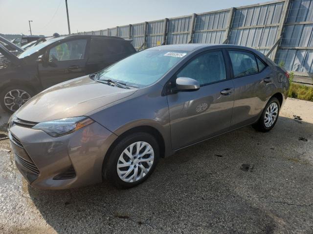 TOYOTA COROLLA L 2019 with VIN 5YFBURHE0KP886038 - Photo from auction