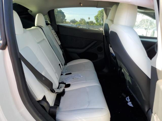 Photo 11 from auction – 2023 TESLA MODEL Y with VIN 7SAYGDEE8PA106010