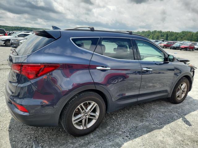 Photo 3 from auction – 2017 HYUNDAI SANTA FE S with VIN 5NMZU3LB8HH019871
