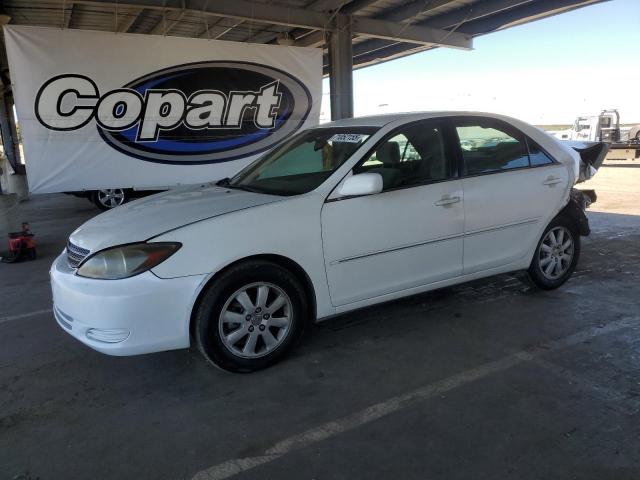 TOYOTA CAMRY LE 2002 with VIN 4T1BE30K42U092413 - Photo from auction