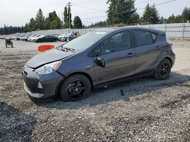 TOYOTA PRIUS C 2014 with VIN JTDKDTB31E1064474 - Photo from auction