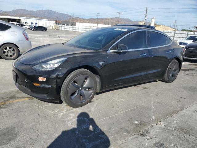TESLA MODEL 3 2020 with VIN 5YJ3E1EAXLF657349 - Photo from auction