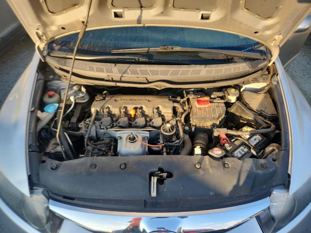 Photo 11 from auction – 2011 HONDA CIVIC LX with VIN 19XFA1F58BE030096