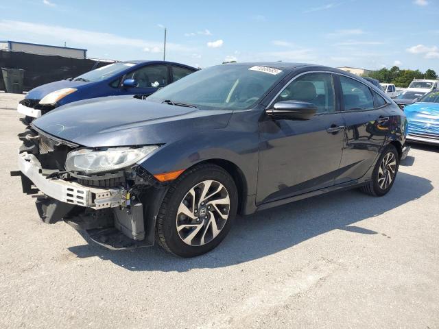 HONDA CIVIC EX 2018 with VIN 2HGFC2F72JH516652 - Photo from auction