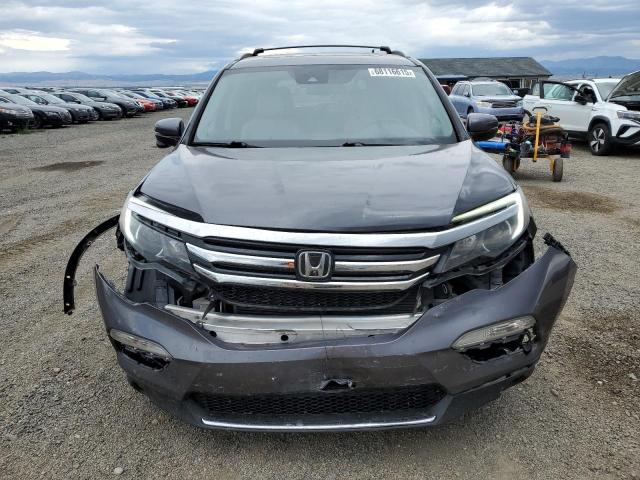 Photo 5 from auction – 2016 HONDA PILOT TOUR with VIN 5FNYF6H92GB057674