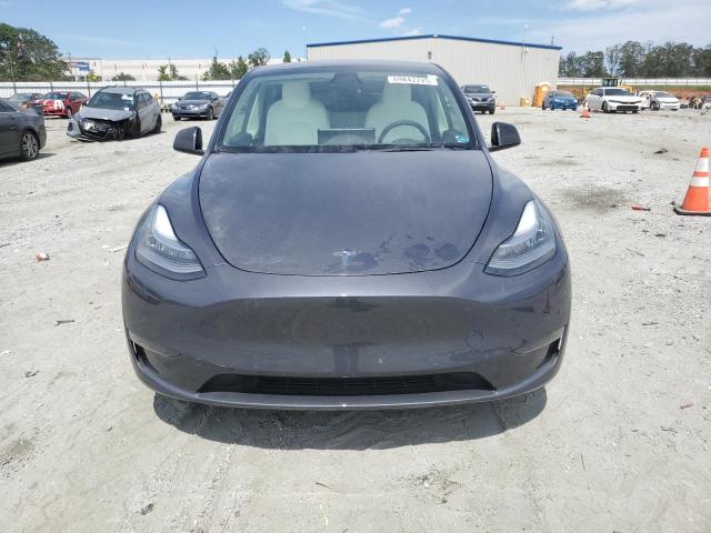 Photo 5 from auction – 2022 TESLA MODEL Y with VIN 7SAYGAEE2NF382147