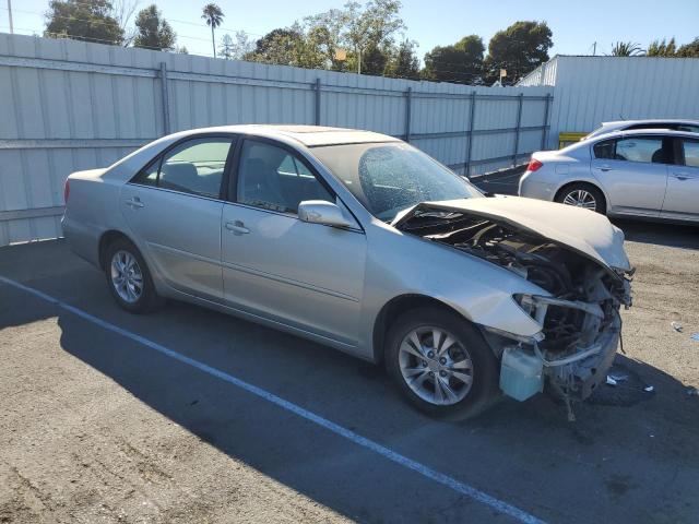 Photo 4 from auction – 2004 TOYOTA CAMRY LE with VIN 4T1BF30K94U580983